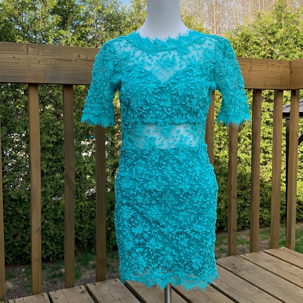 Luxxel | Embroidered and textured teal dress